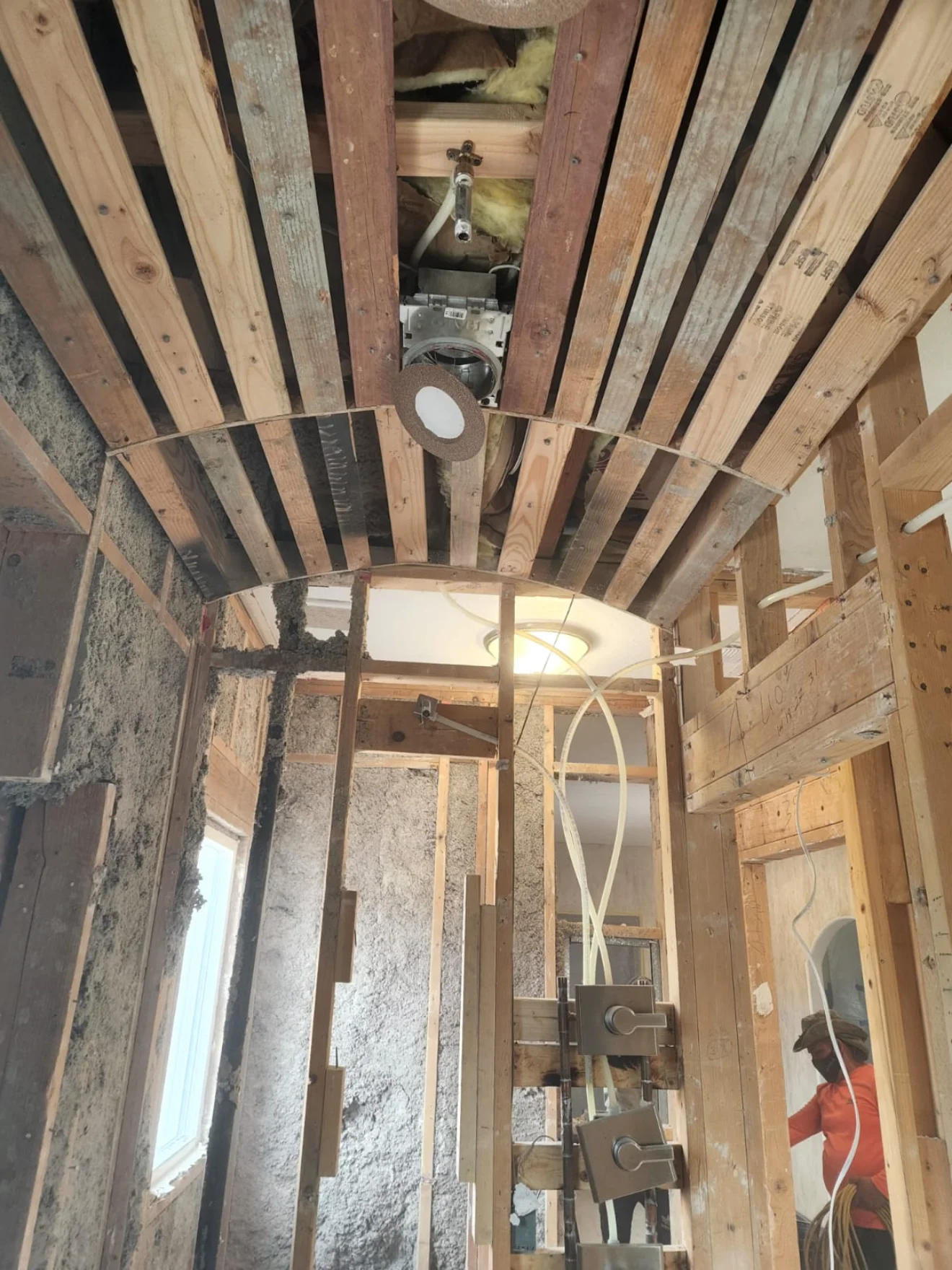 Interior demolition in progress - exposed ceiling rafters, Blackline Demo Phoenix AZ
